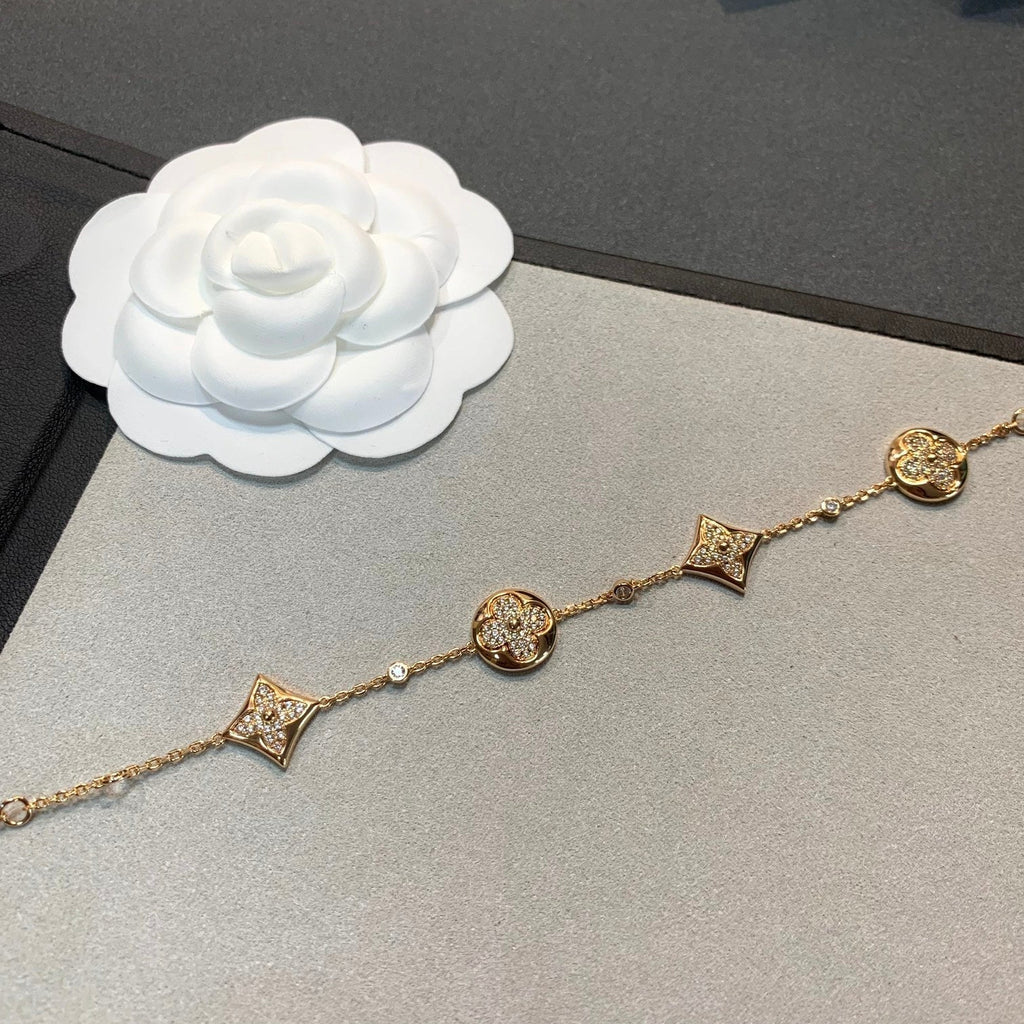 ¡®Star¡¯STAR AND SUN 4 MOTIFS GOLD DIAMONDS BRACELET