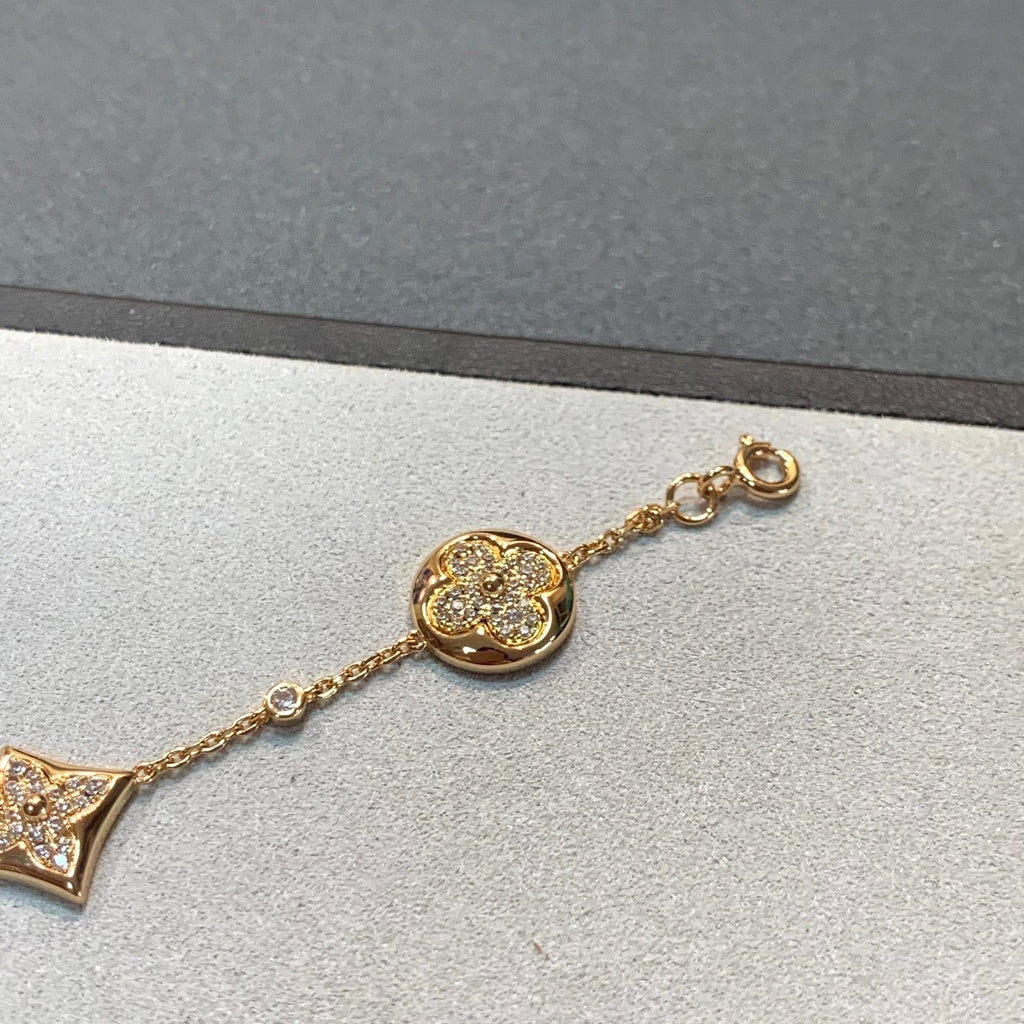 ¡®Star¡¯STAR AND SUN 4 MOTIFS GOLD DIAMONDS BRACELET