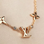 ¡®Star¡¯STAR AND SUN 7 MOTIFS GOLD BRACELET