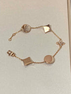 ¡®Star¡¯STAR AND SUN 5 MOTIF MOP PINK GOLD BRACELET