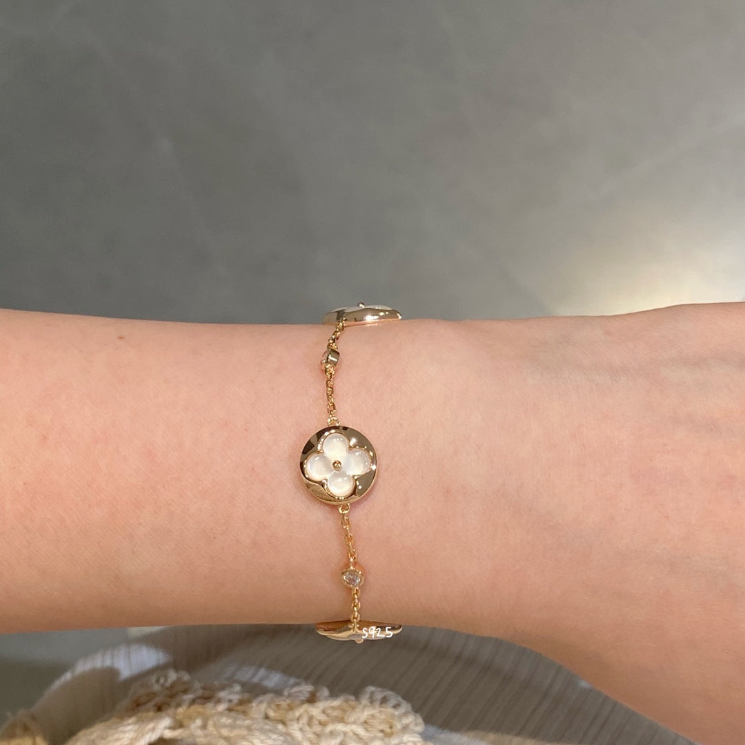 ¡®Star¡¯STAR AND SUN 4 MOTIF WHITE MOP PINK GOLD BRACELET