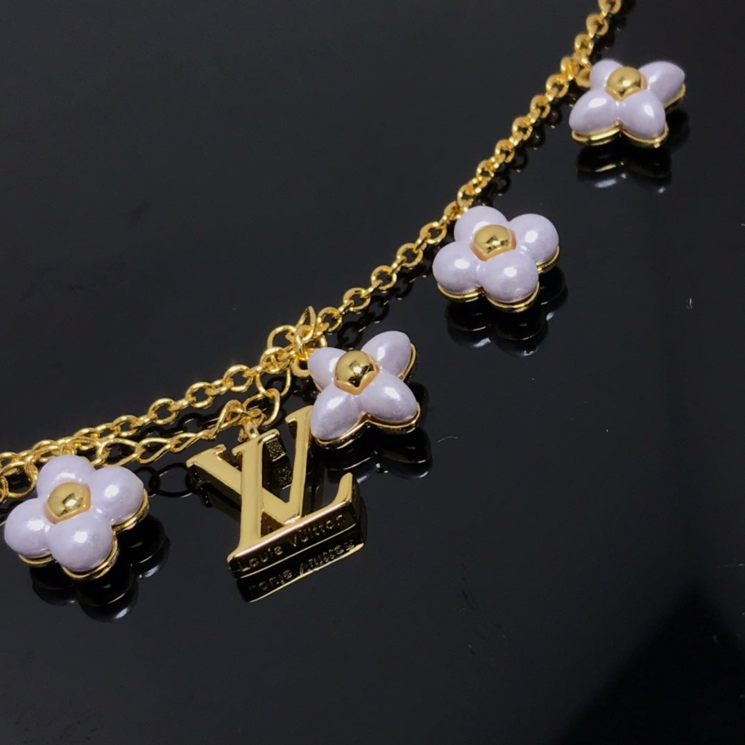 ¡®Star¡¯LOGO 6 MOTIF STAR AND SUN GOLD BRACELET
