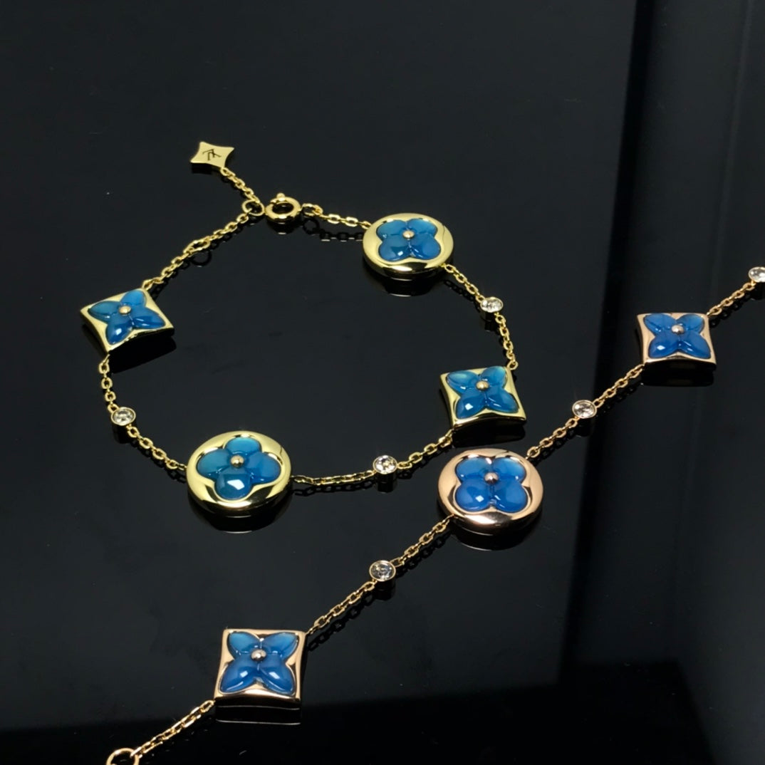 ¡®Star¡¯STAR AND SUN 4 MOTIF BLUE BRACELET