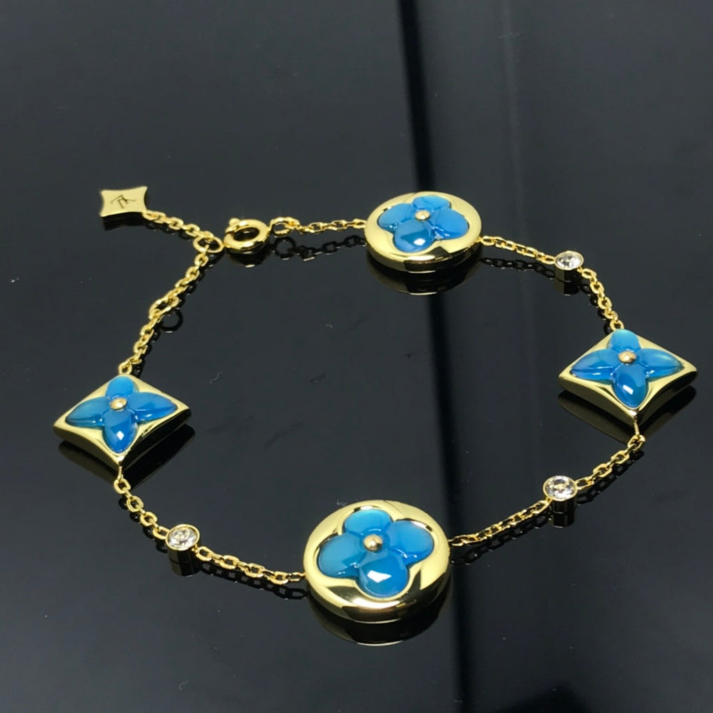 ¡®Star¡¯STAR AND SUN 4 MOTIF BLUE BRACELET